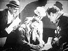 The final alliance among Mac, Peachum, Jenny and Brown - frame enlargement from the 1931 Pabst movie
